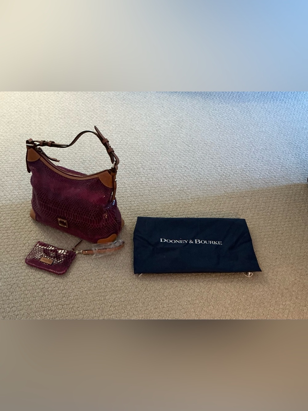 Dooney & Bourke Fuchia/Berry Embossed Leather Hobo with Tan Trim
